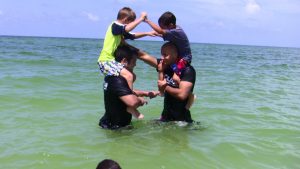 Our Kids Playing Games At The Beach in Our Naples Summer Camp Program- Third Law BJJ- Naples