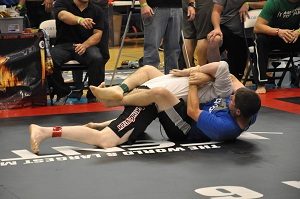 Joey Gephart of Team Third Law BJJ taps an opponent with a kimura for bronze in his no gi division